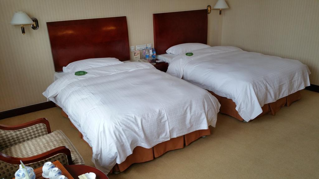 Dalian Jinyuan Hotel Chambre photo